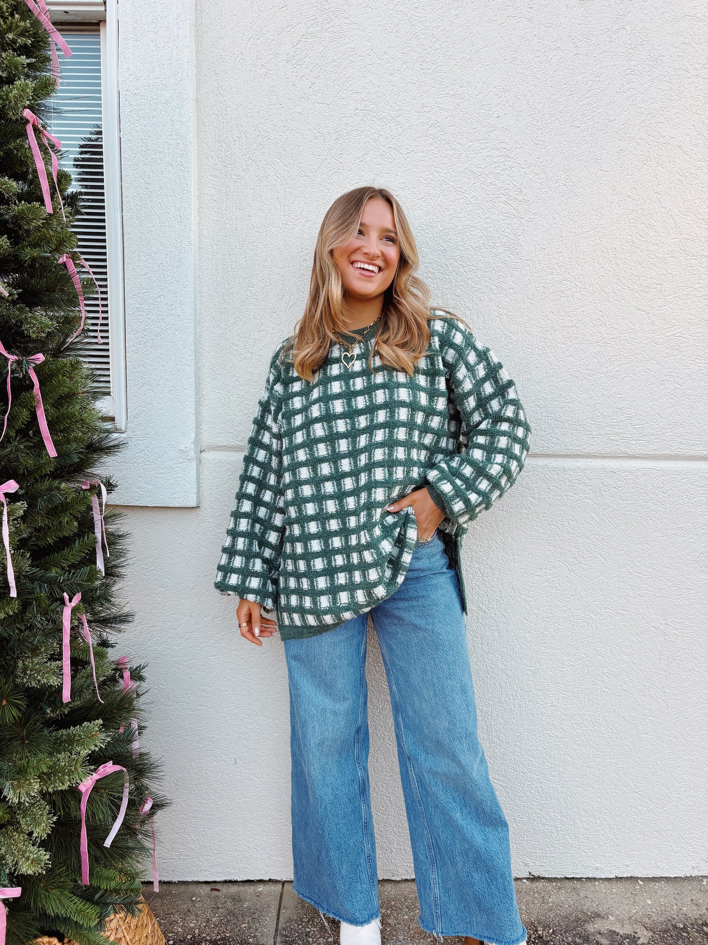 Feelin' Grinchy Checkered Sweater
