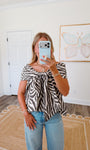Main Attraction Top